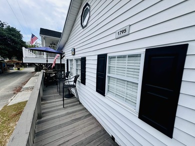 WELL BUILT 2 BED/1 AND A HALF BATH BEACH BUNGALOW WITH on Prestwick Country Club in South Carolina - for sale on GolfHomes.com, golf home, golf lot