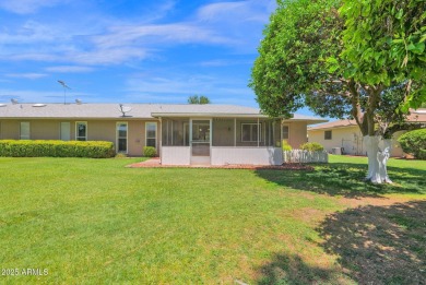 In the heart of Sun City, just steps from the lush Greenbelt and on PalmBrook Country Club in Arizona - for sale on GolfHomes.com, golf home, golf lot