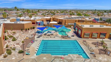 In the heart of Sun City, just steps from the lush Greenbelt and on PalmBrook Country Club in Arizona - for sale on GolfHomes.com, golf home, golf lot