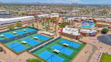 In the heart of Sun City, just steps from the lush Greenbelt and on PalmBrook Country Club in Arizona - for sale on GolfHomes.com, golf home, golf lot
