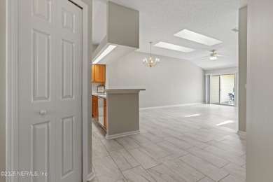 This charming one-story townhome offers easy living in the on Hidden Hills Country Club in Florida - for sale on GolfHomes.com, golf home, golf lot
