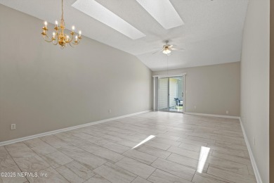 This charming one-story townhome offers easy living in the on Hidden Hills Country Club in Florida - for sale on GolfHomes.com, golf home, golf lot