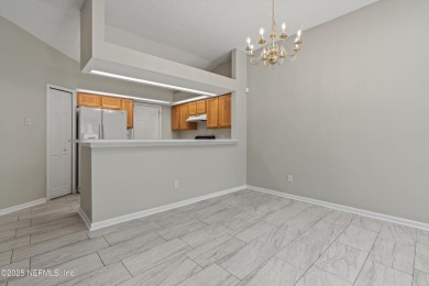 This charming one-story townhome offers easy living in the on Hidden Hills Country Club in Florida - for sale on GolfHomes.com, golf home, golf lot