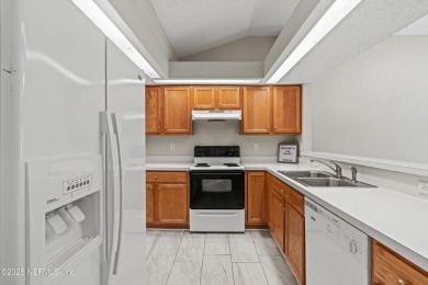 This charming one-story townhome offers easy living in the on Hidden Hills Country Club in Florida - for sale on GolfHomes.com, golf home, golf lot