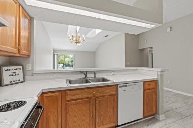This charming one-story townhome offers easy living in the on Hidden Hills Country Club in Florida - for sale on GolfHomes.com, golf home, golf lot