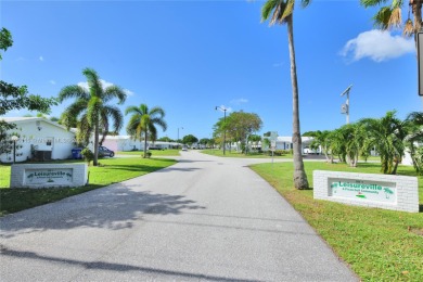 Here's your chance to own a beautiful and cozy home in on Leisureville Community Association in Florida - for sale on GolfHomes.com, golf home, golf lot