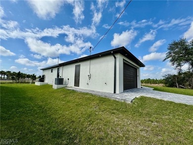 **Stunning New Construction Home in Prime Location!** Welcome to on Burnt Store Golf Club in Florida - for sale on GolfHomes.com, golf home, golf lot
