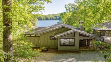 Welcome to an extraordinary lakefront estate on Lake Toxaway on Lake Toxaway Country Club in North Carolina - for sale on GolfHomes.com, golf home, golf lot