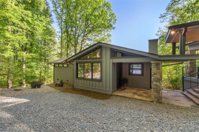 Welcome to an extraordinary lakefront estate on Lake Toxaway on Lake Toxaway Country Club in North Carolina - for sale on GolfHomes.com, golf home, golf lot