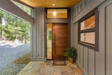 Welcome to an extraordinary lakefront estate on Lake Toxaway on Lake Toxaway Country Club in North Carolina - for sale on GolfHomes.com, golf home, golf lot
