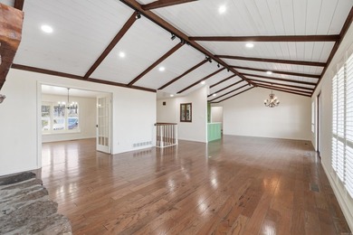 Discover exceptional lake & mountain views from this beautifully on Indian Hills Country Club in Arkansas - for sale on GolfHomes.com, golf home, golf lot