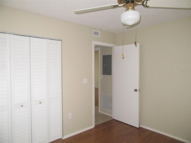 A golfer's dream! First floor, corner unit condo located on Hole on Deep Creek Golf Club in Florida - for sale on GolfHomes.com, golf home, golf lot
