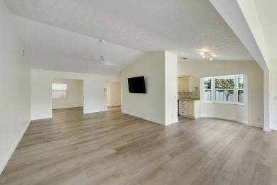 Meticulously Maintained and beautifully updated 3-bedroom on Eagle Wood Golf Course in Florida - for sale on GolfHomes.com, golf home, golf lot