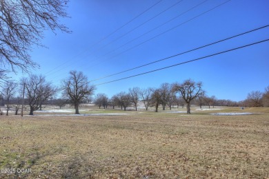 Luxury home located off the #3 tee box in Baxter Springs, KS on Baxter Country Club in Kansas - for sale on GolfHomes.com, golf home, golf lot