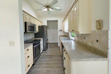 Meticulously Maintained and beautifully updated 3-bedroom on Eagle Wood Golf Course in Florida - for sale on GolfHomes.com, golf home, golf lot