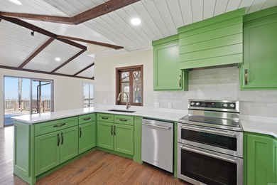 Discover exceptional lake & mountain views from this beautifully on Indian Hills Country Club in Arkansas - for sale on GolfHomes.com, golf home, golf lot