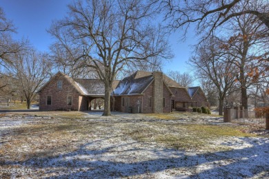 Luxury home located off the #3 tee box in Baxter Springs, KS on Baxter Country Club in Kansas - for sale on GolfHomes.com, golf home, golf lot