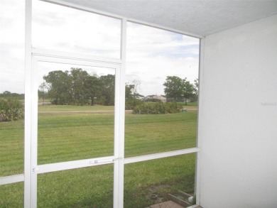 A golfer's dream! First floor, corner unit condo located on Hole on Deep Creek Golf Club in Florida - for sale on GolfHomes.com, golf home, golf lot