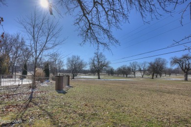 Luxury home located off the #3 tee box in Baxter Springs, KS on Baxter Country Club in Kansas - for sale on GolfHomes.com, golf home, golf lot