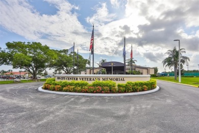 OVERSIZED VACANT LOT WITH 94 FRONT FT OF BEAUTIFUL WATER VIEWS on Caloosa Greens Executive Golf Course in Florida - for sale on GolfHomes.com, golf home, golf lot