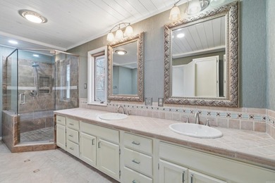 Discover exceptional lake & mountain views from this beautifully on Indian Hills Country Club in Arkansas - for sale on GolfHomes.com, golf home, golf lot