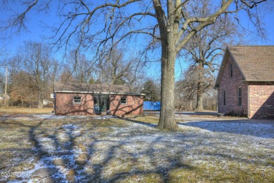 Luxury home located off the #3 tee box in Baxter Springs, KS on Baxter Country Club in Kansas - for sale on GolfHomes.com, golf home, golf lot