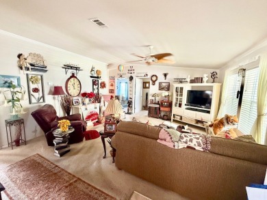 AMAZING CORNER LOT FEATURING A 3-BEDROOM, 2-BATHROOM HOME WITH on Cypress Greens in Florida - for sale on GolfHomes.com, golf home, golf lot
