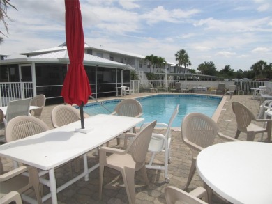 A golfer's dream! First floor, corner unit condo located on Hole on Deep Creek Golf Club in Florida - for sale on GolfHomes.com, golf home, golf lot