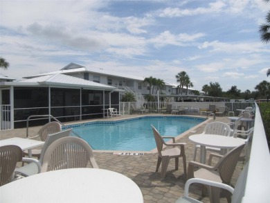 A golfer's dream! First floor, corner unit condo located on Hole on Deep Creek Golf Club in Florida - for sale on GolfHomes.com, golf home, golf lot