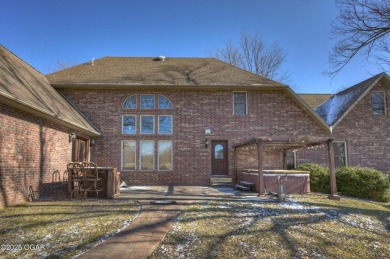 Luxury home located off the #3 tee box in Baxter Springs, KS on Baxter Country Club in Kansas - for sale on GolfHomes.com, golf home, golf lot