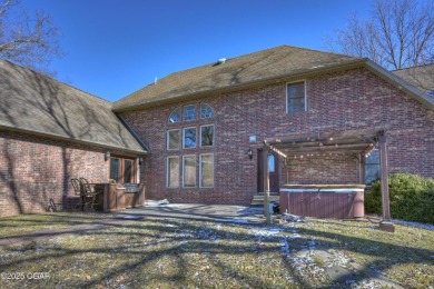 Luxury home located off the #3 tee box in Baxter Springs, KS on Baxter Country Club in Kansas - for sale on GolfHomes.com, golf home, golf lot