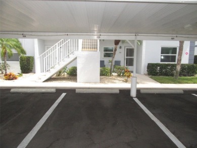 A golfer's dream! First floor, corner unit condo located on Hole on Deep Creek Golf Club in Florida - for sale on GolfHomes.com, golf home, golf lot