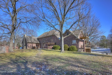 Luxury home located off the #3 tee box in Baxter Springs, KS on Baxter Country Club in Kansas - for sale on GolfHomes.com, golf home, golf lot