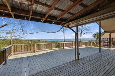 Discover exceptional lake & mountain views from this beautifully on Indian Hills Country Club in Arkansas - for sale on GolfHomes.com, golf home, golf lot