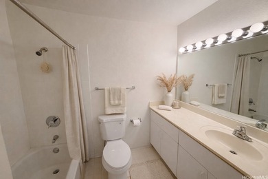 Welcome home to comfort, convenience, and elevated island on Leilehua Golf Course in Hawaii - for sale on GolfHomes.com, golf home, golf lot