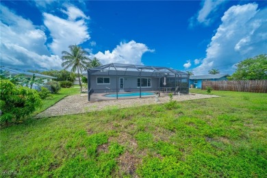 Affordable Pool Home in the Tarpon Point Marina Area of SW Cape on Royal Tee Country Club in Florida - for sale on GolfHomes.com, golf home, golf lot