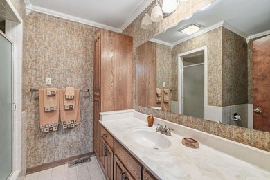 Discover exceptional lake & mountain views from this beautifully on Indian Hills Country Club in Arkansas - for sale on GolfHomes.com, golf home, golf lot