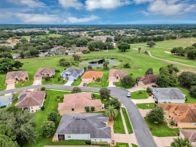 AVAILABLE FOR QUICK CLOSING. Affordable Low-Maintenance Stucco on Arlington Ridge Golf Club in Florida - for sale on GolfHomes.com, golf home, golf lot