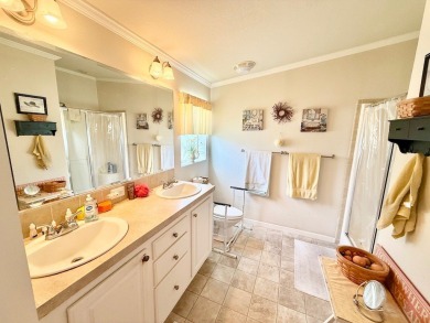 AMAZING CORNER LOT FEATURING A 3-BEDROOM, 2-BATHROOM HOME WITH on Cypress Greens in Florida - for sale on GolfHomes.com, golf home, golf lot