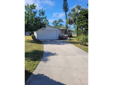 The Lot Rent for this home is $1,248.00/monthly.  The beauty of on Pine Lakes Country Club in Florida - for sale on GolfHomes.com, golf home, golf lot