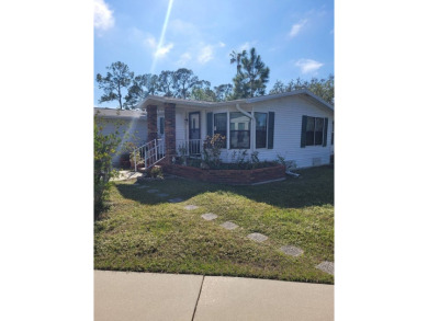 The Lot Rent for this home is $1,248.00/monthly.  The beauty of on Pine Lakes Country Club in Florida - for sale on GolfHomes.com, golf home, golf lot