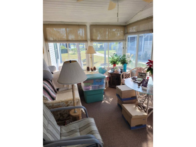 This 2-bedroom, 2-bathroom home is a little dated, but with a on Pine Lakes Country Club in Florida - for sale on GolfHomes.com, golf home, golf lot