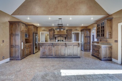 Luxury home located off the #3 tee box in Baxter Springs, KS on Baxter Country Club in Kansas - for sale on GolfHomes.com, golf home, golf lot