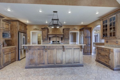 Luxury home located off the #3 tee box in Baxter Springs, KS on Baxter Country Club in Kansas - for sale on GolfHomes.com, golf home, golf lot