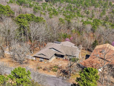 Discover exceptional lake & mountain views from this beautifully on Indian Hills Country Club in Arkansas - for sale on GolfHomes.com, golf home, golf lot