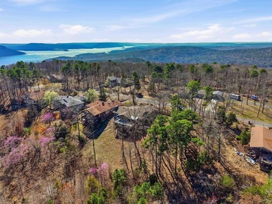 Discover exceptional lake & mountain views from this beautifully on Indian Hills Country Club in Arkansas - for sale on GolfHomes.com, golf home, golf lot