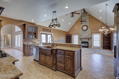 Luxury home located off the #3 tee box in Baxter Springs, KS on Baxter Country Club in Kansas - for sale on GolfHomes.com, golf home, golf lot