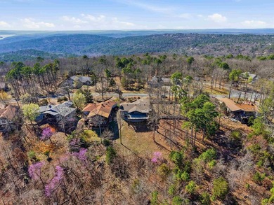 Discover exceptional lake & mountain views from this beautifully on Indian Hills Country Club in Arkansas - for sale on GolfHomes.com, golf home, golf lot