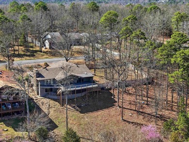Discover exceptional lake & mountain views from this beautifully on Indian Hills Country Club in Arkansas - for sale on GolfHomes.com, golf home, golf lot