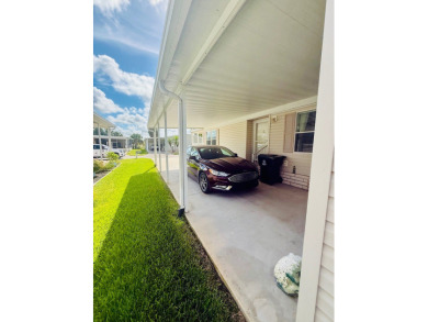 AMAZING CORNER LOT FEATURING A 3-BEDROOM, 2-BATHROOM HOME WITH on Cypress Greens in Florida - for sale on GolfHomes.com, golf home, golf lot